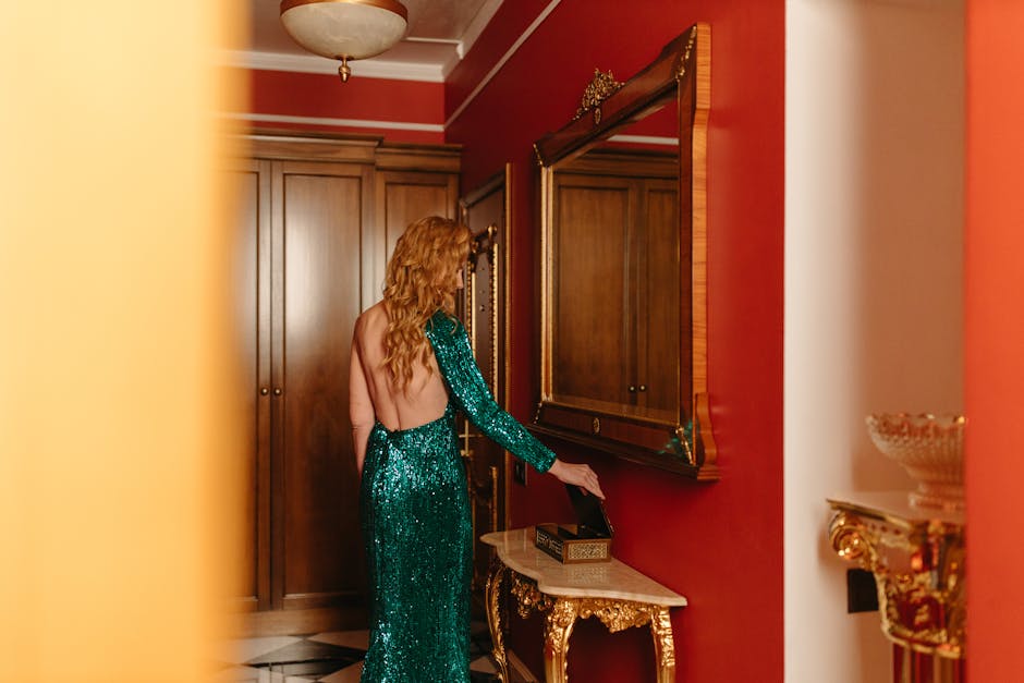 Exclusive VIP event with champagne service and elegantly dressed guests in the casino lounge with red carpet and gold decorations